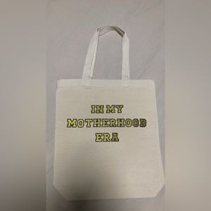 IN MY MOTHERHOOD ERA CANVAS TOTE BAG
